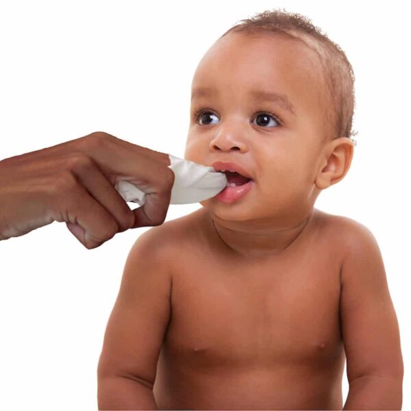 Parent Wiping Baby's Teeth with a Tooth Tissue