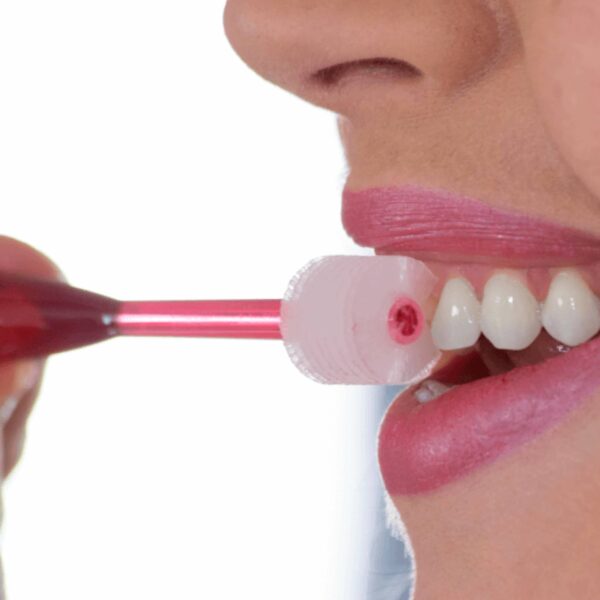 Woman Using Brilliant Oral Care Pink Round Toothbrush
